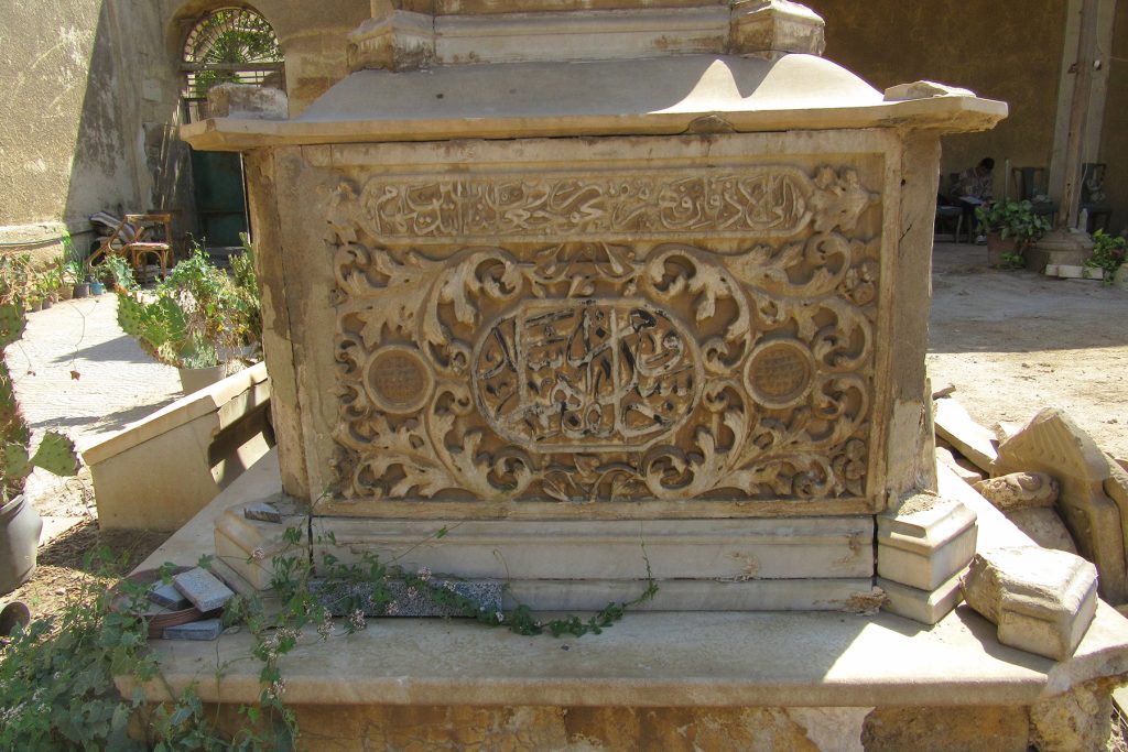 Marble cenotaph, detail, N side