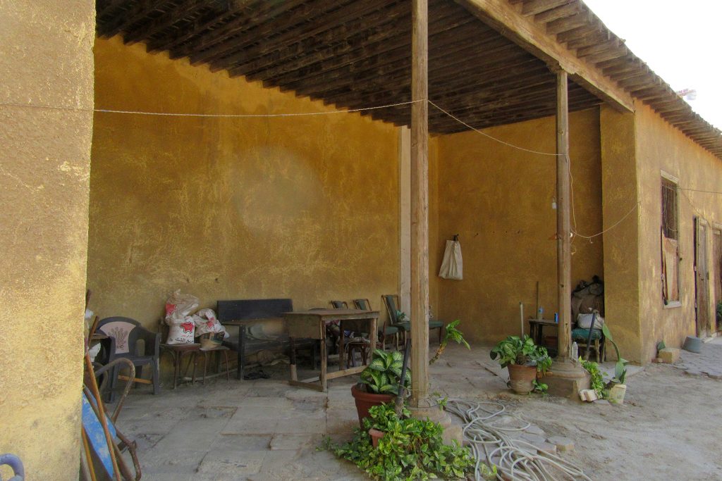 Open-fronted seating area overlooking the courtyard