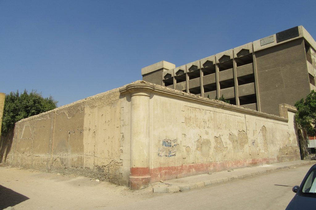 Street corner view showing the S and W elevations