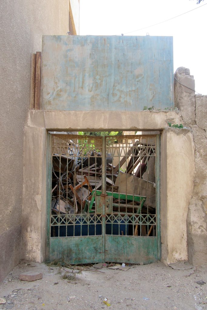 Unused gate of the primary school, E. side